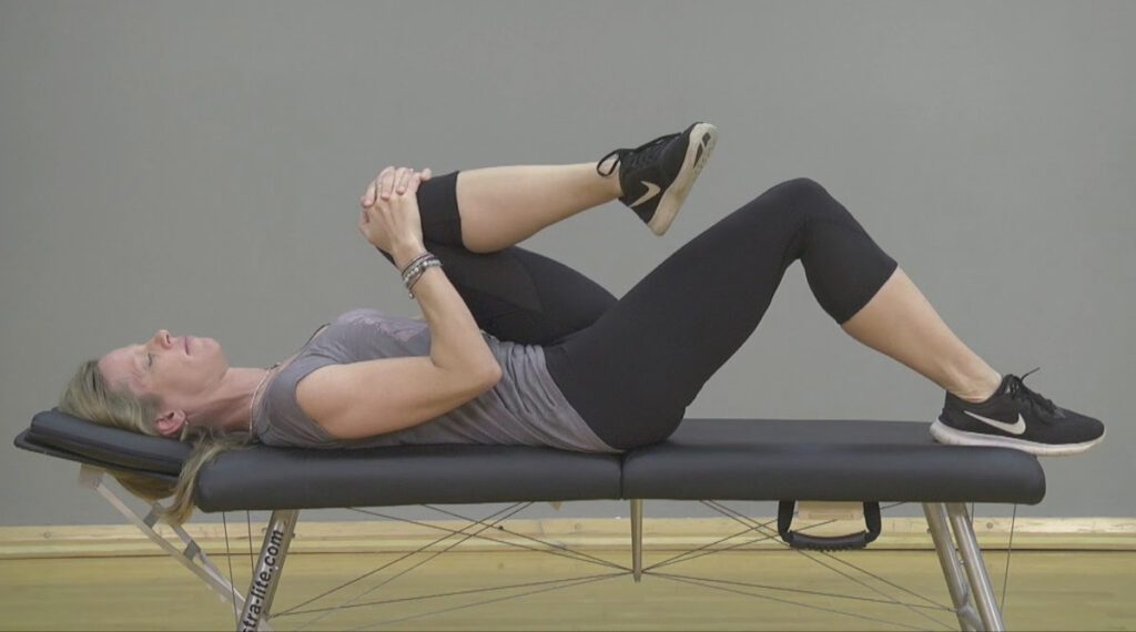 knees to chest stretch